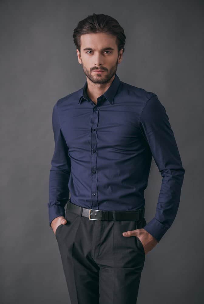 black shirt blue dress pants Cinosural International School