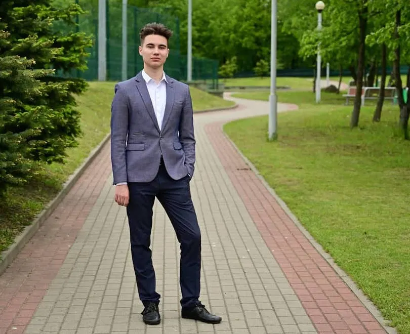 grey blazer white shirt and black pants