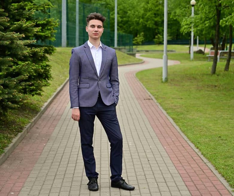 grey blazer white shirt and black pants