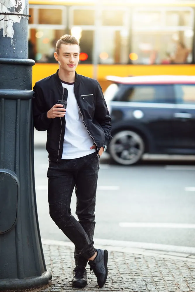  jeans with black sneakers and white t shirt 