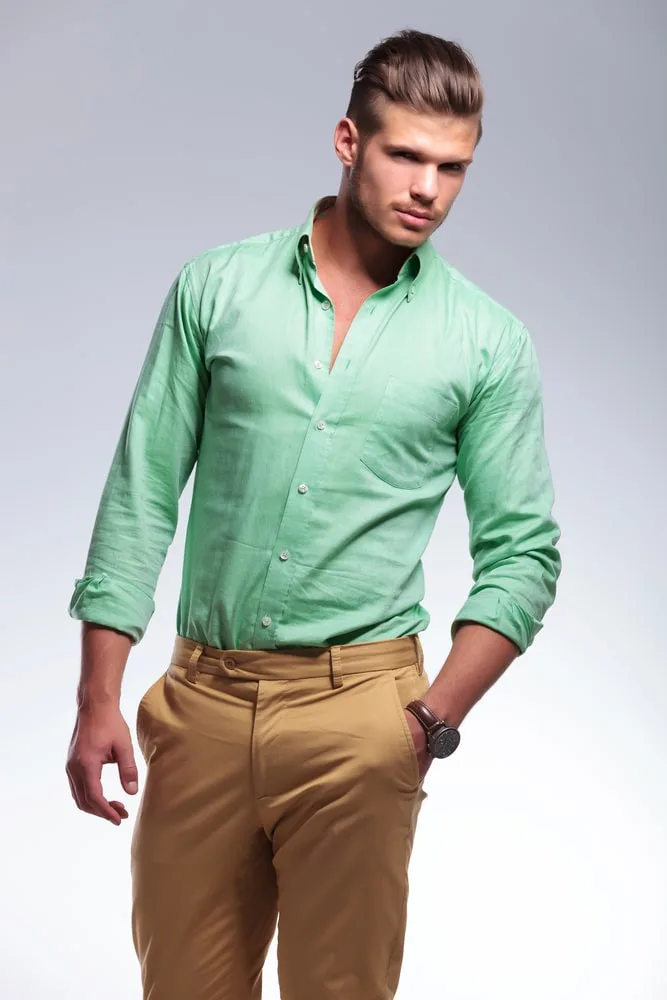 light green shirt with khaki pants