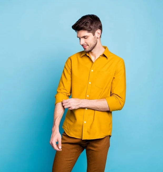 mustard yellow shirt with brown pants