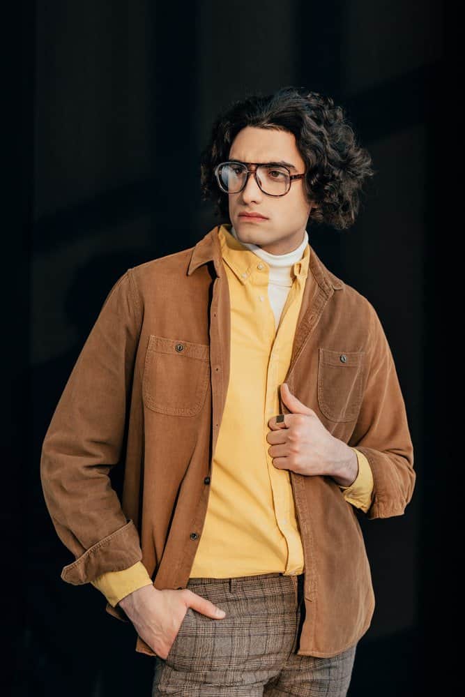 orange shirt with brown pants