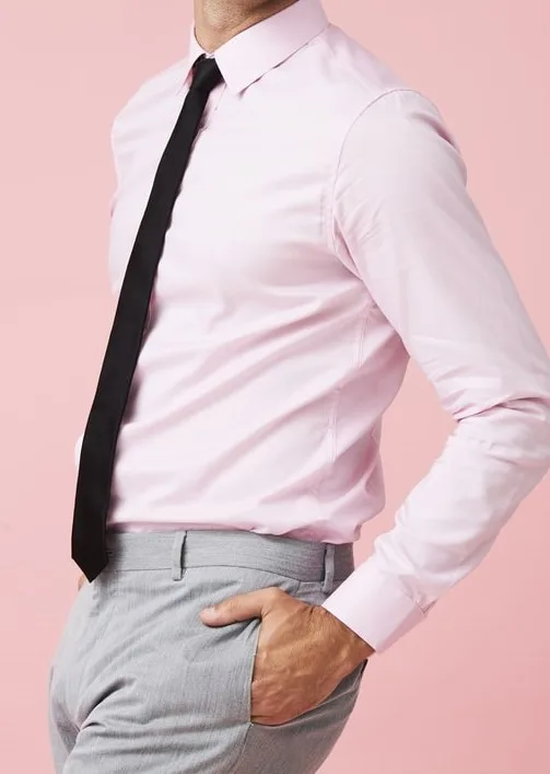 pink shirt and grey pants 