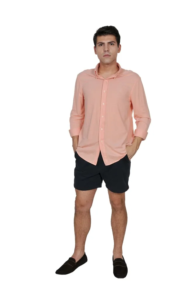 pink shirt with navy shorts