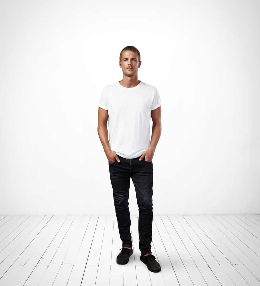 white t shirt and dark blue jeans