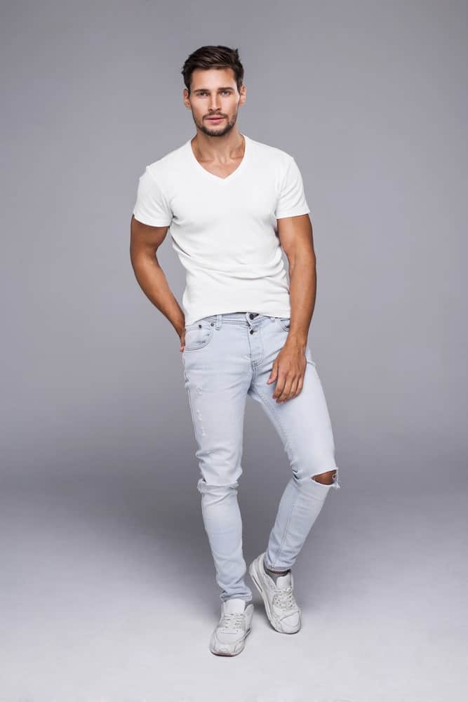 white t shirt french tucked into jeans