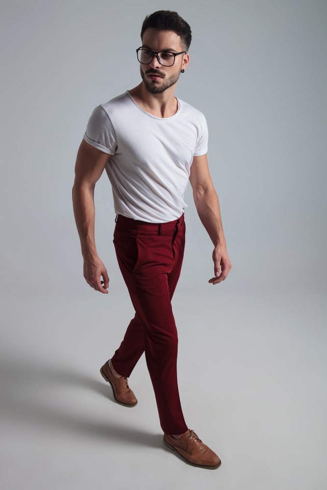 white t shirt red pants and brown shoes 