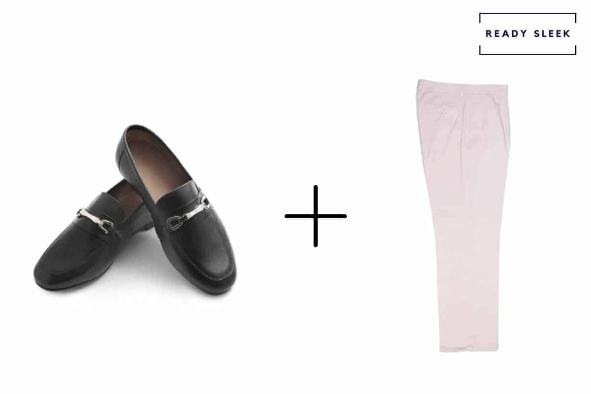 black horsebit loafers alone + beige pants