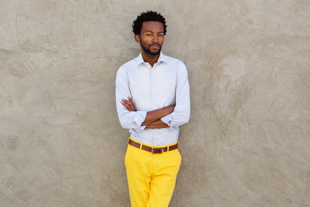 blue shirt and yellow pants