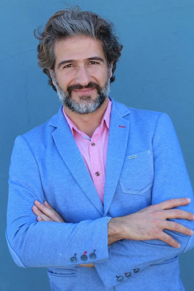 light pink shirt blue suit