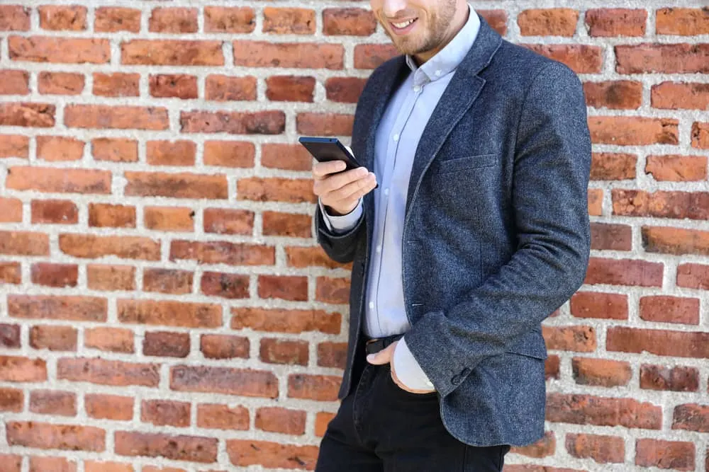 Charcoal grey jacket with black trousers