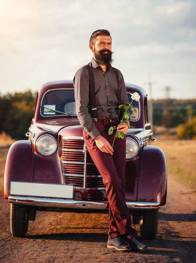 man in maroon pants