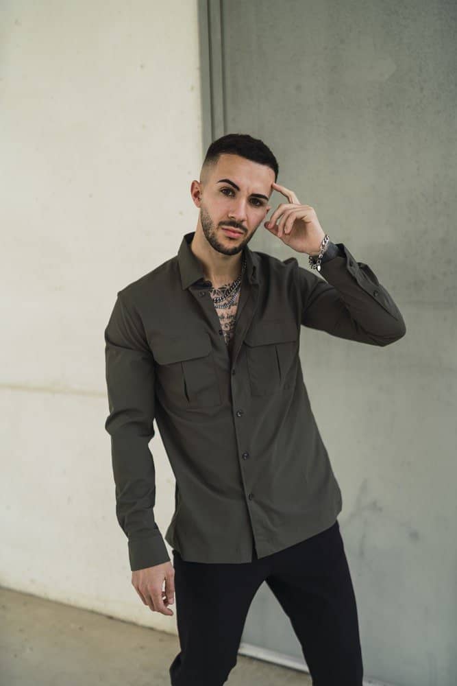 olive green shirt with black pants