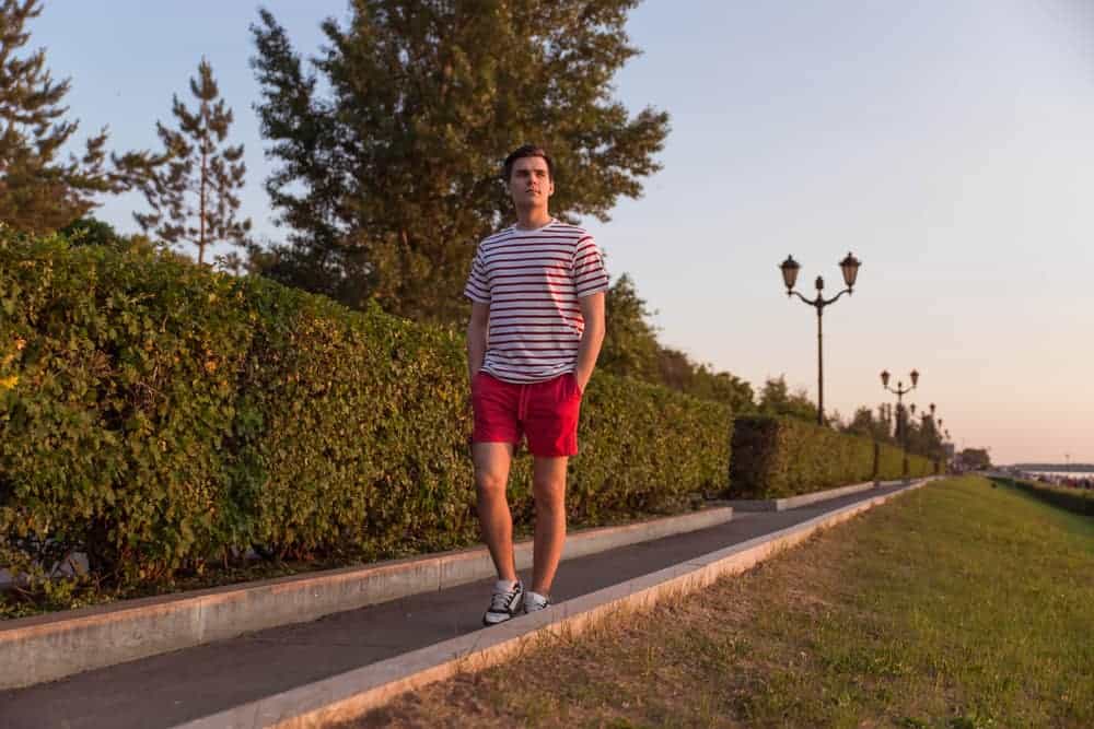 white t shirt and red shorts 