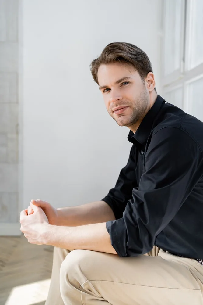 black shirt and white pants