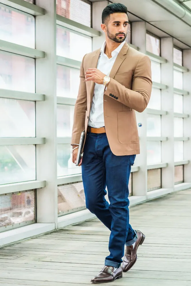 blue jeans brown shoes and brown blazer