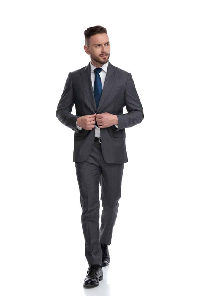 grey suit and black shoes