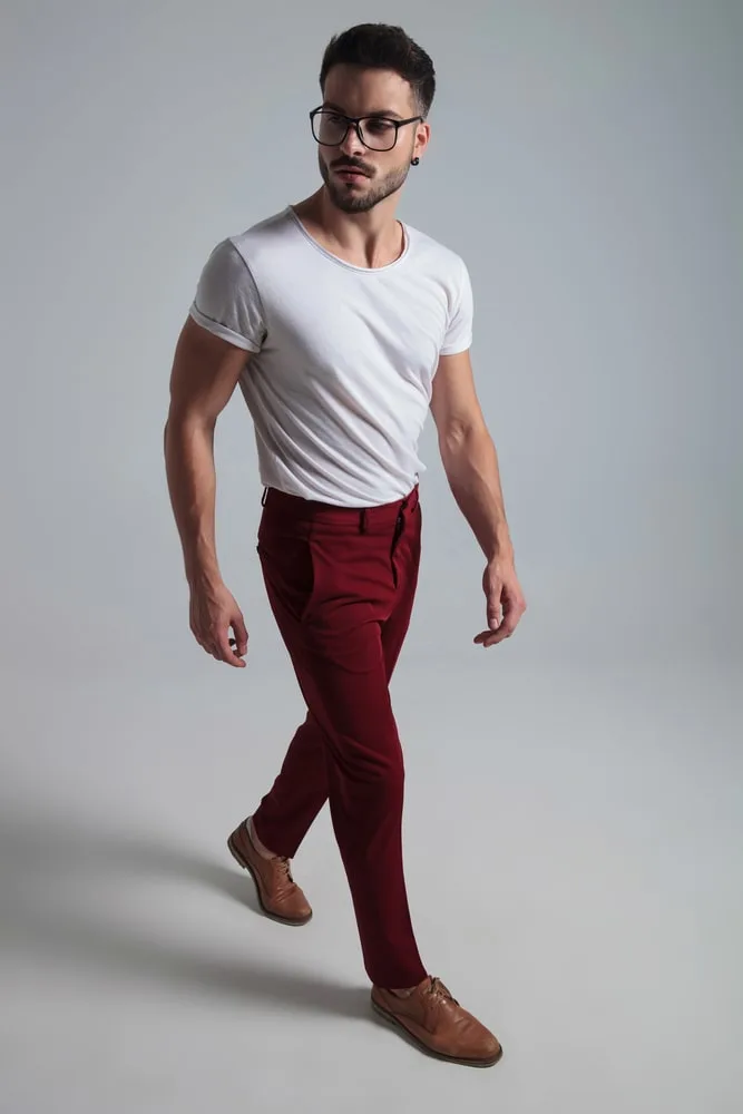 white t shirt red pants and brown shoes
