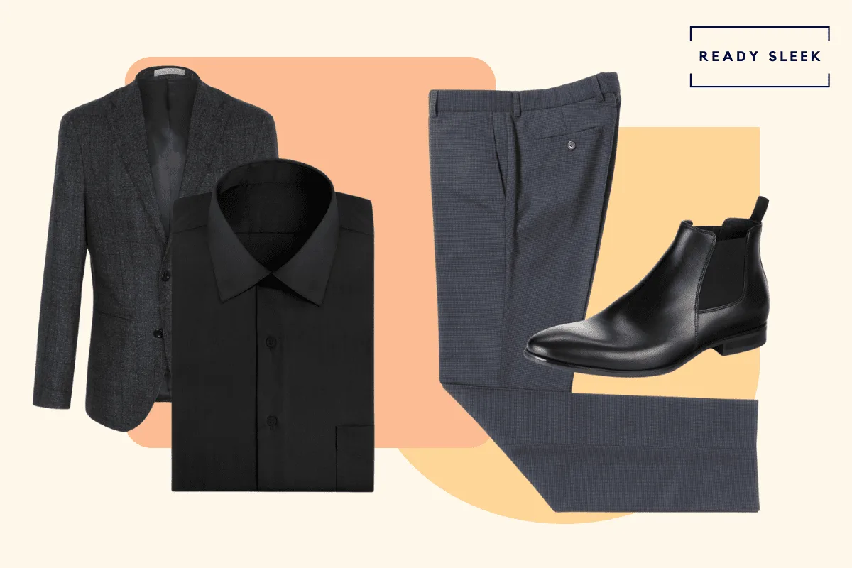 Black blazer with black shirt, dark grey pants and black leather chelsea boots