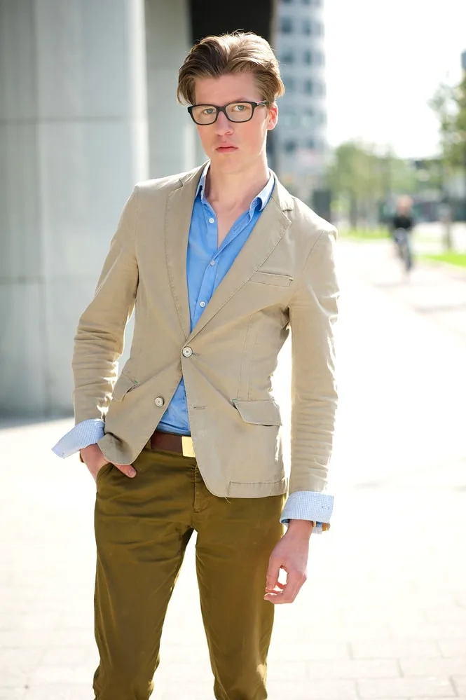 beige blazer and blue shirt