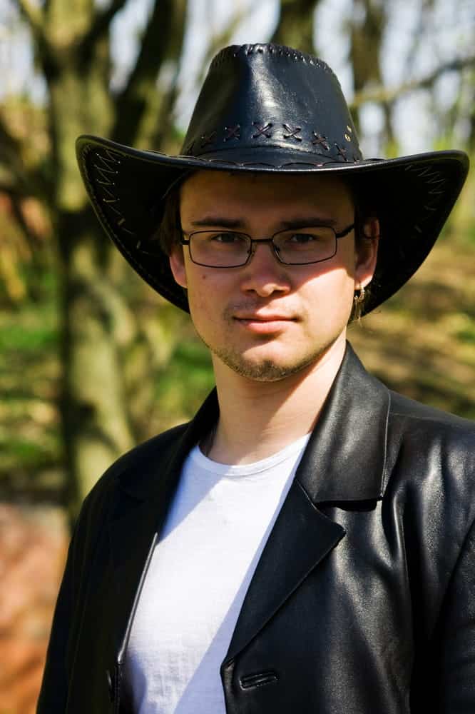 black cowboy hat with glasses 