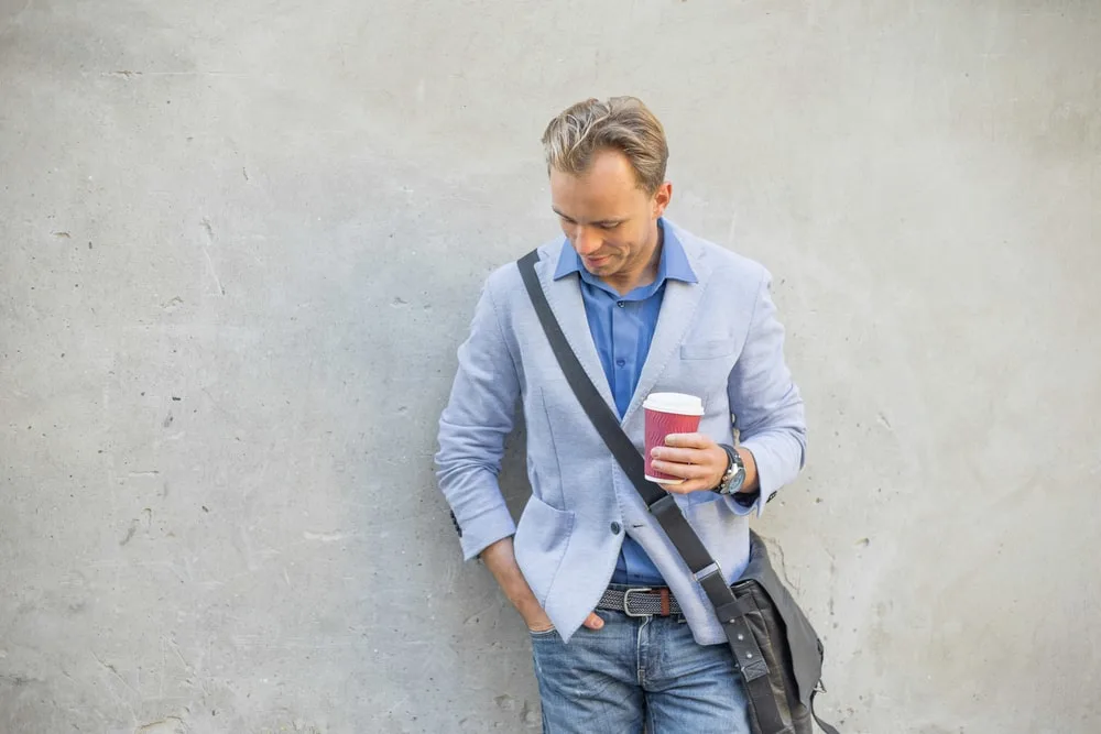 light grey blazer and blue shirt