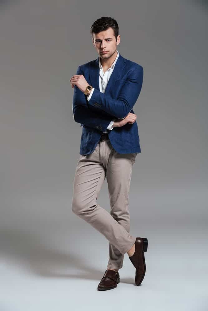 navy blazer grey pants and brown shoes
