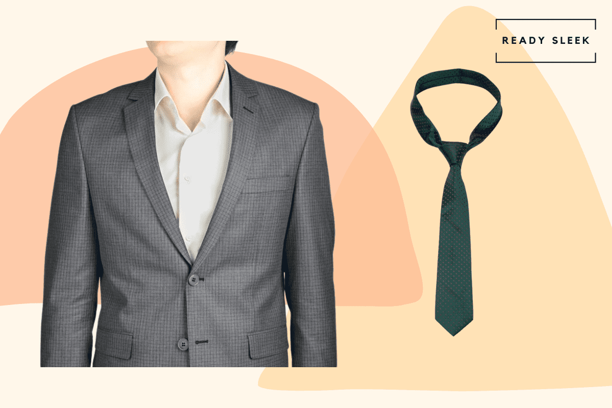 Medium grey suit with forest green tie