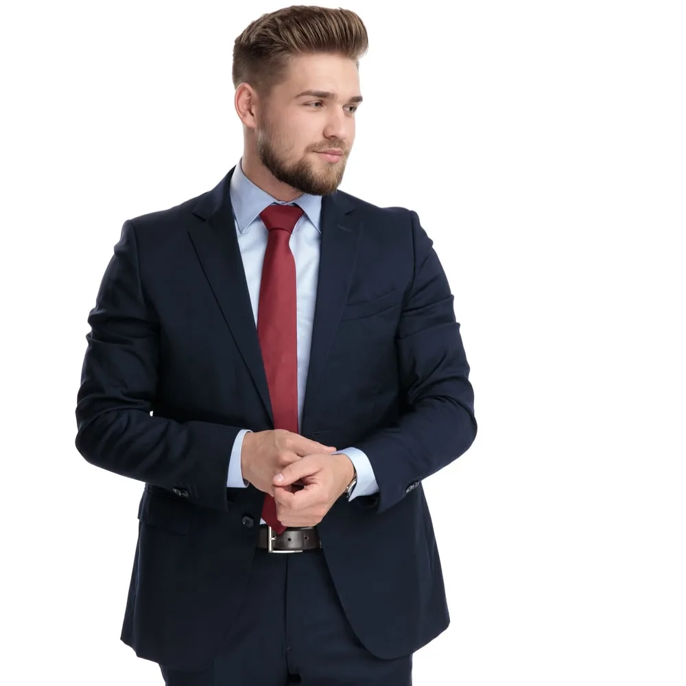 navy suit and red tie