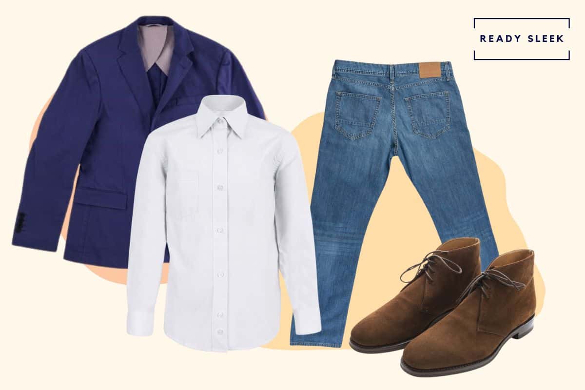 White casual shirt with medium blue jeans, blue blazer and brown chukka boots