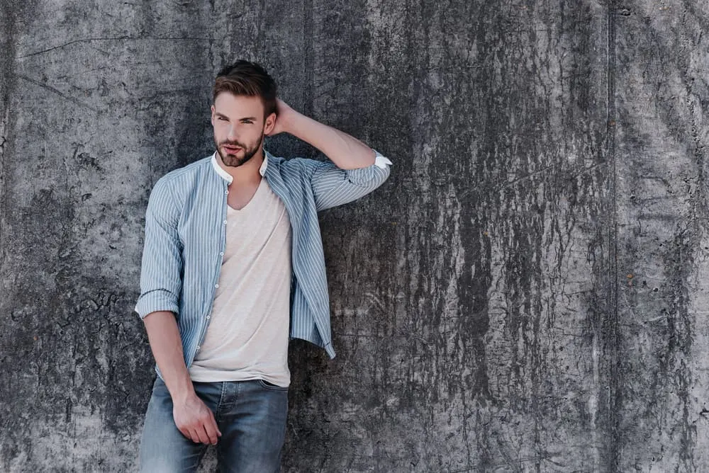 blue shirt with grey jeans