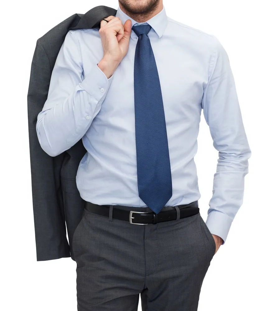 grey suit with a light blue shirt and tie