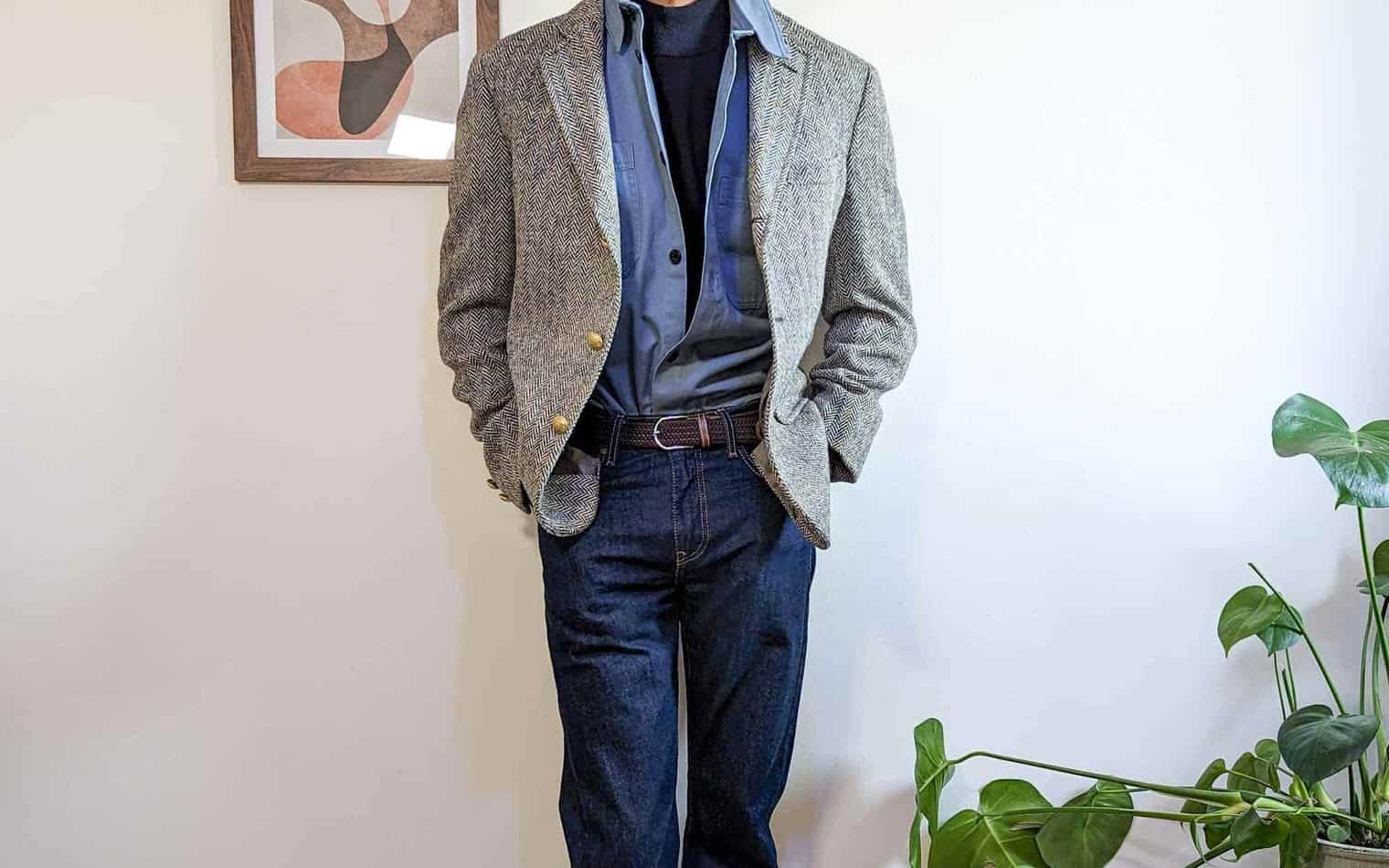 grey blazer black mock neck sweater dark blue jeans blue overshirt 2