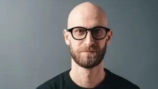 Shaved Head Beard And Glasses